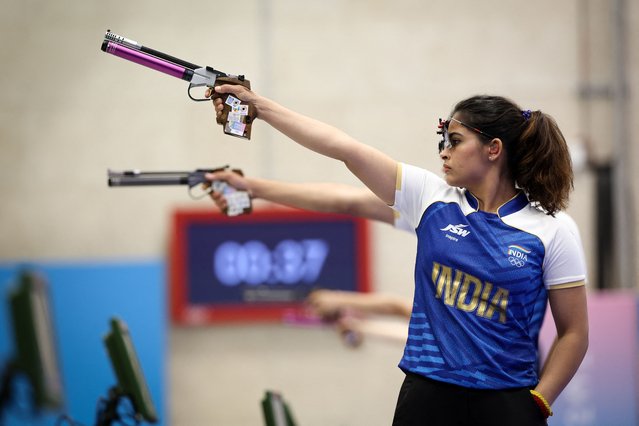 India's Manu Bhaker competes competes in 10m air pistol mixed team bronze medal match during the Paris 2024 Olympic Games at Chateauroux Shooting Centre on July 30, 2024. (Photo by Alain Jocard/AFP Photo)