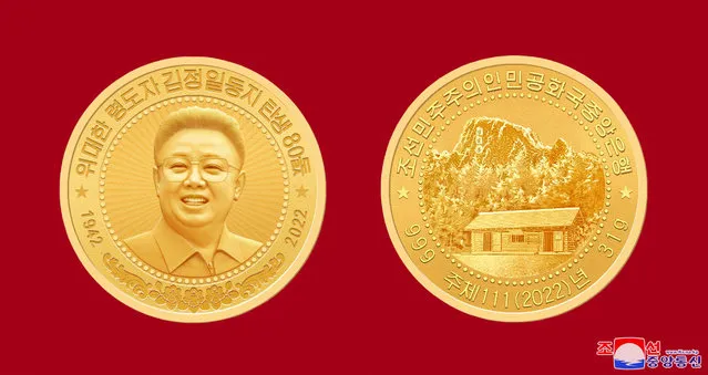 This undated picture released by North Korea's official Korean Central News Agency (KCNA) on February 15, 2022 shows a commemorative gold coin which will be minted in North Korea to mark the occasion of the 80th birth anniversary of the late North Korean leader Kim Jong Il. (Photo by KCNA via KNS/AFP Photo)
