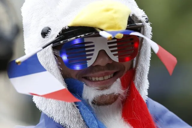 Football Soccer, France vs Romania, EURO 2016, Group A, Paris, France on June 10, 2016. A France soccer fan arrives at fan zone in Paris. (Photo by Gonzalo Fuentes/Reuters)