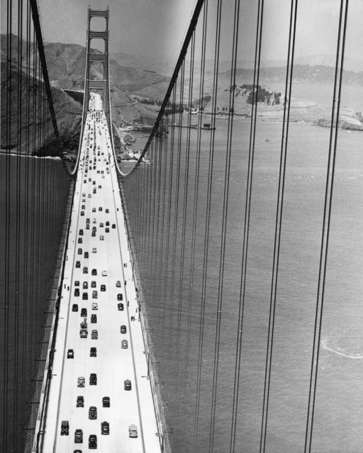 High-angle view of traffic and pedestrians using the Golden Gate Bridge, San Francisco, California, circa 1937. (Photo by Hulton Archive/Getty Images)