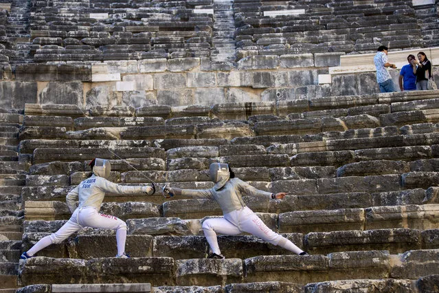 Players perform a show at the Aspendos Antique Theater in the district of Serik before the championship to be held by the International Fencing Federation and the European Fencing Confederation at Antalya Sports Hall in Antalya, Turkiye on June 16, 2022. (Photo by Mustafa Ciftci/Anadolu Agency via Getty Images)
