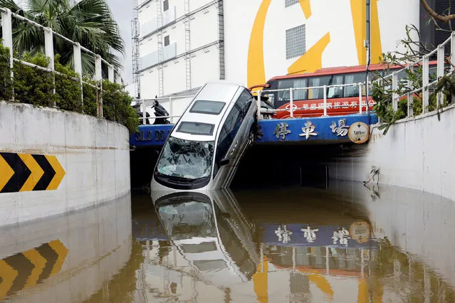 A vehicle damaged by Typhoon Hato is seen in Macau, China on August 24, 2017. (Photo by Tyrone Siu/Reuters)