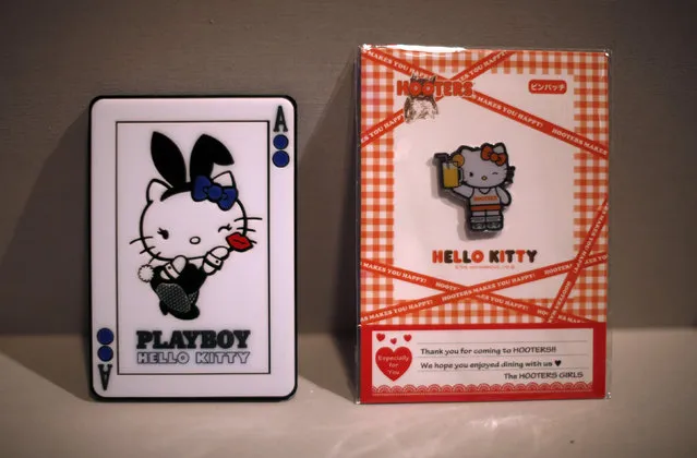 Cards depicting Hello Kitty as a Playboy bunny and a Hooters Girl are seen at the “Hello! Exploring the Supercute World of Hello Kitty” museum exhibit in honor of Hello Kitty's 40th anniversary, at the Japanese American National Museum in Los Angeles, California October 10, 2014. (Photo by Lucy Nicholson/Reuters)