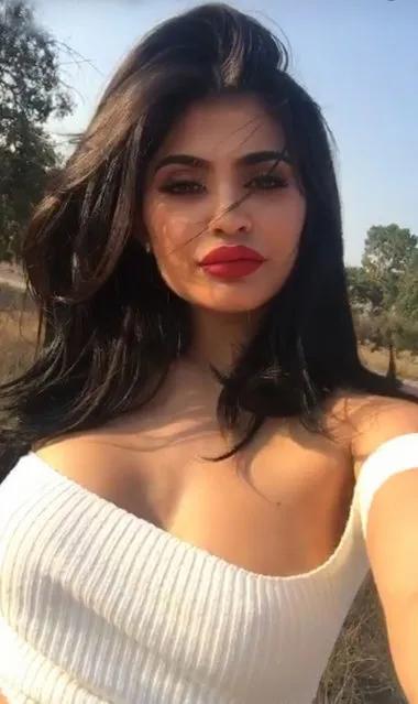 Kylie Jenner shows off a lot of cleavage in these new photos added to her Snapchat account on Thursday,  August 25, 2016. Something that a lot of the 19-year-old reality star's fans pointed out was that her breasts looked larger than normal and she took to Twitter to explain why. Kylie said that she has “never” gotten her breasts done and that they look large because “it's that time of the month”. She even offered to let a fan feel them to prove that they are real! “They will deflate soon. And it will be a sad sad day”, Kylie added. (Photo by Scope Features)