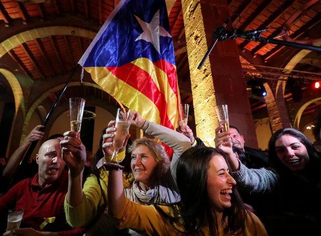 People react to results in Catalonia's regional elections at a gathering of the Catalan National Assembly (ANC) in Barcelona, Spain December 21, 2017. (Photo by Albert Gea/Reuters)