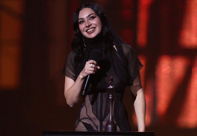 English singer and songwriter Charli xcx receives the award for Artist Of The Year during the BRIT Awards at the O2 Arena in London, Britain, on March 1, 2025. (Photo by Isabel Infantes/Reuters)