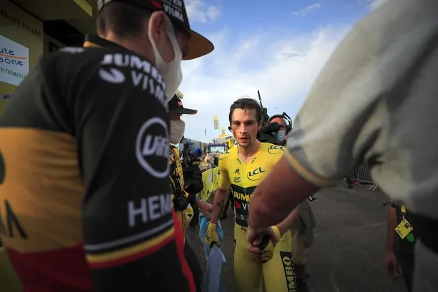 Slovenia's Primoz Roglic walks away after losing the overall leader's yellow jersey after stage 20 of the Tour de France cycling race, an individual time trial over 36.2 kilometers (22.5 miles), from Lure to La Planche des Belles Filles, France, Saturday, September 19, 2020. (Photo by Christophe Petit-Tesson/Pool via AP Photo)