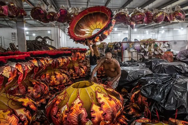 Employees of the Salgueiro samba school prepare for the Silver Series of the Rio de Janeiro Carnival, in Rio de Janeiro, Brazil, 01 February 2023 (issued 03 February 2023). In Rio de Janeiro, more than fifty “escolas de samba” (samba schools) not belonging to the “big leagues” samba schools parading in the Sambadrome are seeking to shine in their parades during the traditional celebration. The carnival festivities will run this year from 17 to 22 February. (Photo by Andre Coelho/EPA)