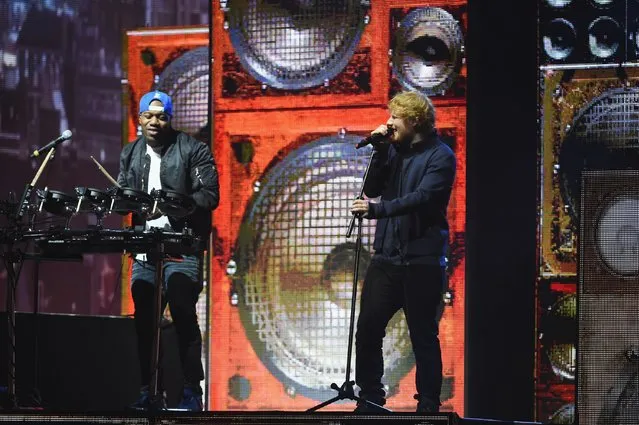 Host Ed Sheeran performs with DJ Locksmith of Rudimental during the MTV EMA's 2015 at the Mediolanum Forum on October 25, 2015 in Milan, Italy. (Photo by Brian Rasic/Getty Images for MTV)