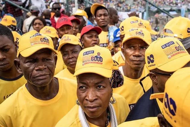 Supporters of the All Progressive Congress (APC) gather inside the Teslim Balogun Stadium in Lagos on February 21, 2023 ahead of the ahead of the Nigerian presidential election scheduled for February 25, 2023. (Photo by John Wessels/AFP Photo)