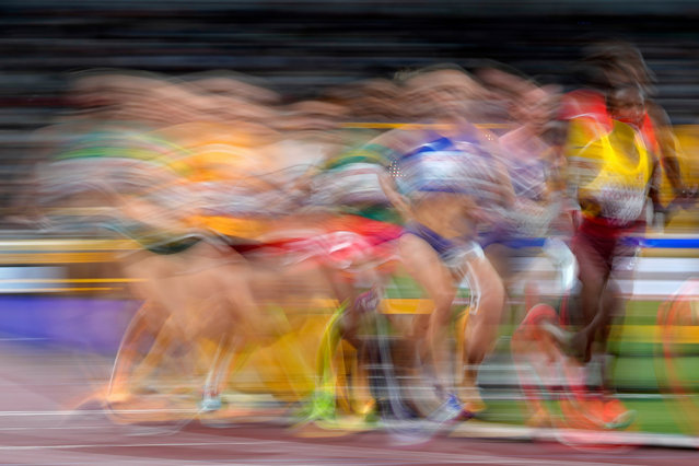 Athletes race in a women's 5,000 meters heat at the World Athletics Championships in Tokyo, Thursday, September 18, 2025. (Photo by Petr David Josek/AP Photo)