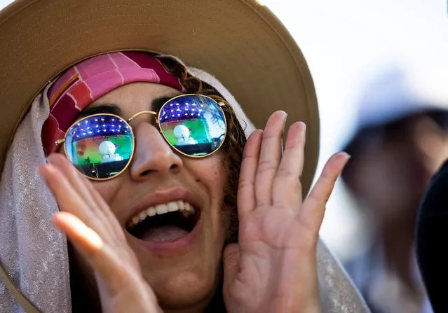A spectator watches SG Lewis perform onstage at the Coachella Valley Music & Arts Festival, in Indio, California, U.S., April 21, 2023. (Photo by Aude Guerrucci/Reuters)