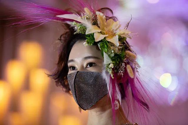 A model looks on during the 2020 Korea Mask Fashion show in Seoul, South Korea, 24 July 2020. (Photo by Jeon Heon-Kyun/EPA/EFE)