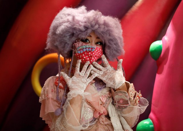 Monster girl Baby Manafy, an iconic Harajuku girl and a staff member of the cafe, wearing a face mask poses for a photograph at Kawaii Monster Cafe, amid the coronavirus disease (COVID-19) outbreak, in Tokyo, Japan on January 31, 2021. (Photo by Issei Kato/Reuters)