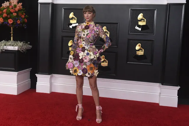 Taylor Swift poses in the press room at the 63rd annual Grammy Awards at the Los Angeles Convention Center on Sunday, March 14, 2021. (Photo by Jordan Strauss/Invision/AP Photo)