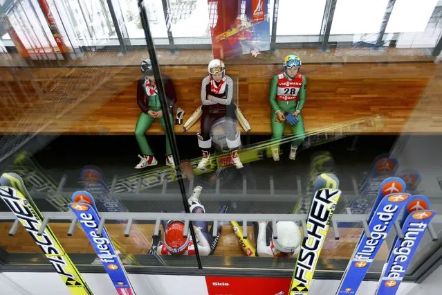 Athletes prepare for a training session of the women's Individual normal hill HS100 ski jumping at the Nordic World Ski Championships in Falun February 18, 2015. (Photo by Kai Pfaffenbach/Reuters)