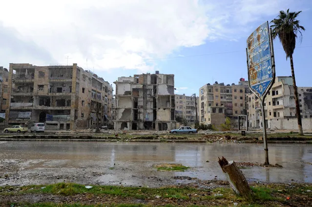 Damaged buildings are pictured near al-Sheehan roundabout after government forces took control of the area in Aleppo, Syria December 2, 2016. (Photo by Omar Sanadiki/Reuters)