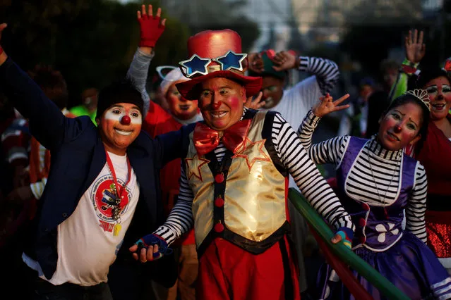 Clowns participate in a parade during Salvadoran Clown Day celebrations in San Salvador, El Salvador,  December 7, 2016. (Photo by Jose Cabezas/Reuters)