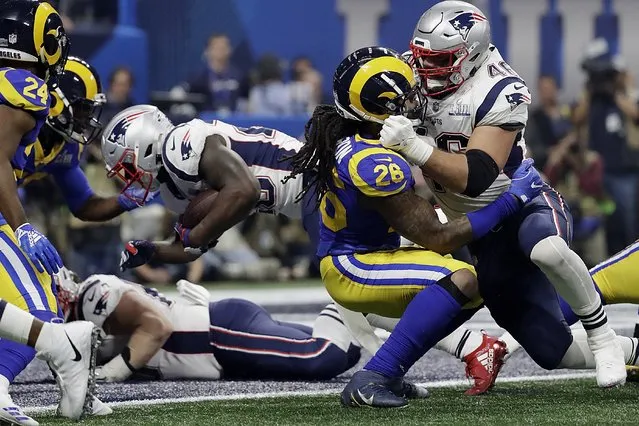 New England Patriots' Sony Michel dives for a touchdown during the second half of the NFL Super Bowl 53 football game against the Los Angeles Rams, Sunday, February 3, 2019, in Atlanta. (Photo by Jeff Roberson/AP Photo)