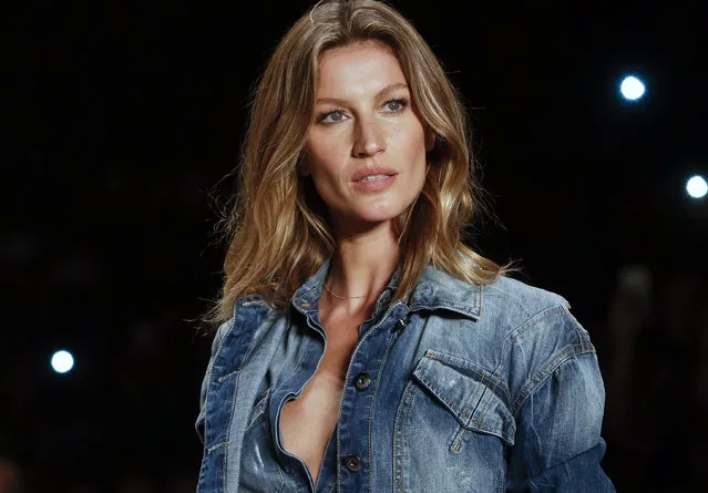 In this November 4, 2014 file photo, Brazilian supermodel Gisele Bundchen wears a creation from the Colcci Winter collection at Sao Paulo Fashion Week in Sao Paulo, Brazil. Bundchen, who has been lighting up catwalks around the world for the past 20 years, is retiring from the runway. The 34-year-old mother-of-two has said her catwalk appearance on Wednesday, April 15, 2015 at Sao Paulo Fashion Week would be the last of her career. (Photo by Andre Penner/AP Photo)