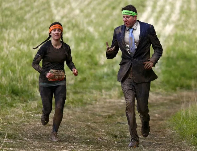 Competitors participate in the Tough Mudder challenge near Henley-on-Thames in southern England May 2, 2015. (Photo by Eddie Keogh/Reuters)