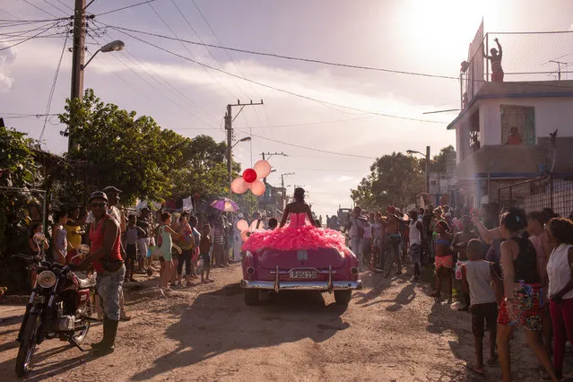 Contemporary issues, singles winner: The Cubanitas, by Diana Markosian. Pura rides around her neighbourhood in a pink 1950s convertible, as the community gathers to celebrate her 15th birthday, in Havana, Cuba. (Photo by Diana Markosian/Magnum Photos/World Press Photo 2019)