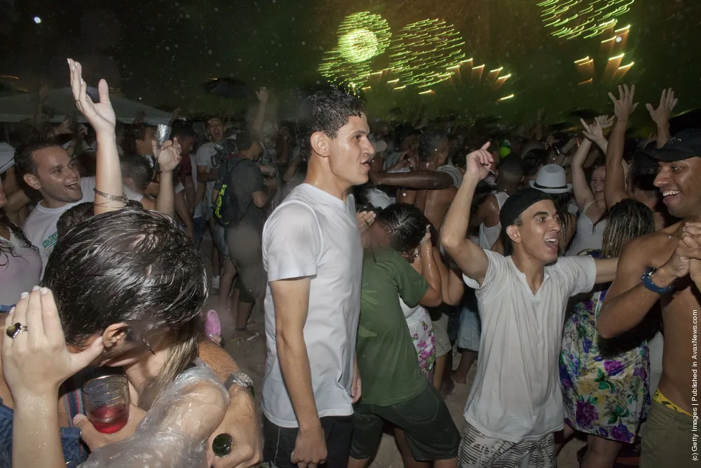 Brazilians Flock To Ocean For New Year's Eve Ritual