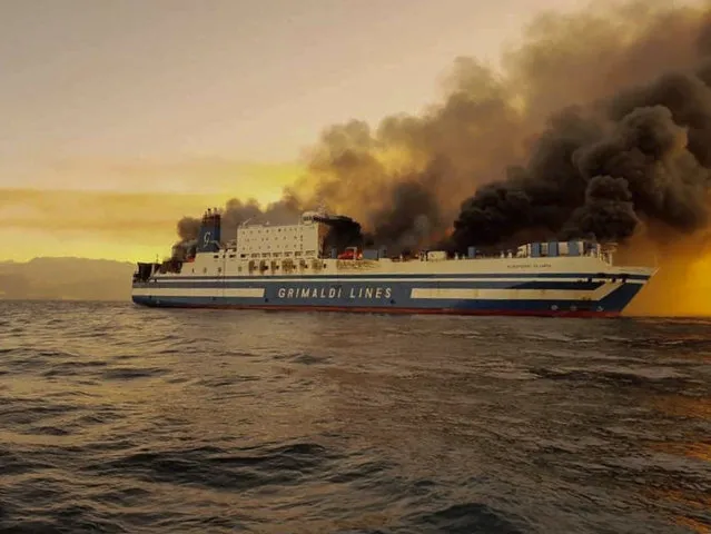 A ferry is on fire at the Ionian Sea near the island of Corfu, Greece, on Friday, February 18, 2022. More than 280 people have been evacuated from the ferry in northwestern Greece that caught fire overnight, while heading to southern Italy, authorities said. (Photo by Lazos Mantikos/debater.gr via AP Photo)