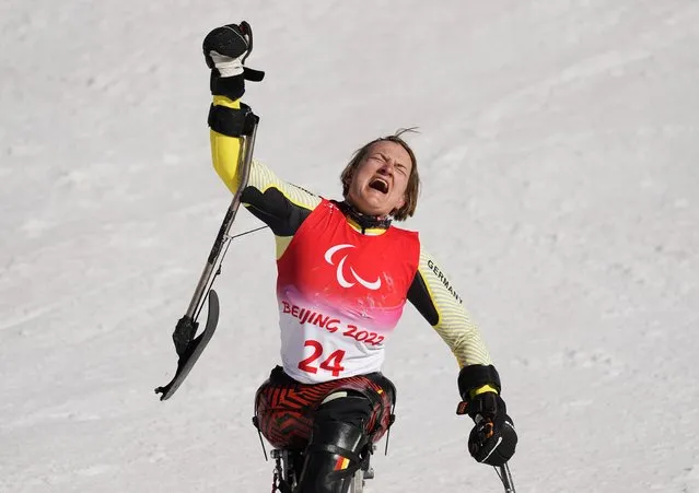 Gold medallist German's Anna-Lena Forster celebrates after winning the women's super combined sitting slalom event at the Yanqing National Alpine Skiing Centre in Yanqing during the Beijing 2022 Winter Paralympic Games on March 7, 2022. (Photo by Aly Song/Reuters)