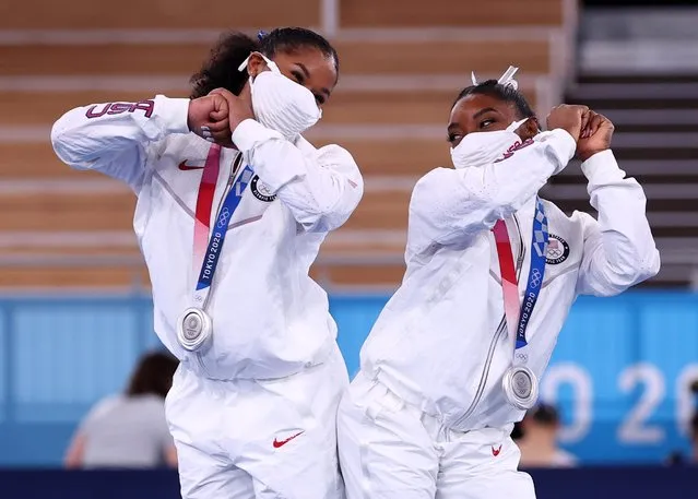 Simone Biles and Jordan Chiles of the United States react after receiving their silver medals during the Team final for Women at Ariake Gymnastics Centre during the Tokyo 2020 Summer Olympic Games on July 27, 2021 in Tokyo, Japan. (Photo by Mike Blake/Reuters)