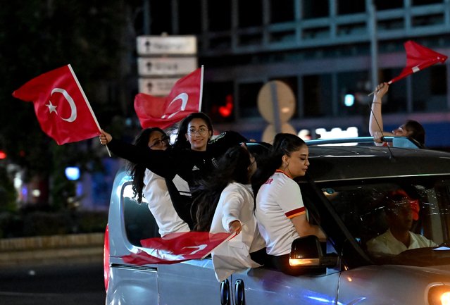 Turkish fans celebrate after their team qualified for last 16 stages following victory with car convoys in the UEFA EURO 2024 group stage match between Czechia and Turkiye on June 26, 2024 in Ankara, Turkiye. (Photo by Rasit Aydogan/Anadolu via Getty Images)