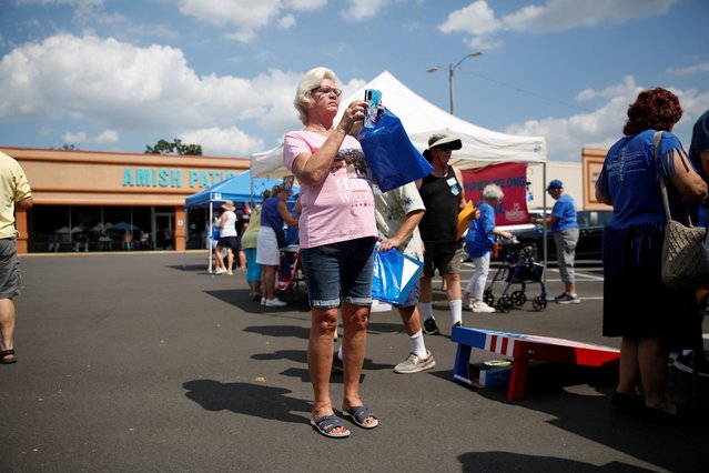 A woman attends the Florida Democratic Party and Team Harris-Walz for Florida’s 'Kamalanomenon Celebration in The Villages' voter event at The Villages, Florida, U.S. August 18, 2024. (Photo by Octavio Jones/Reuters)