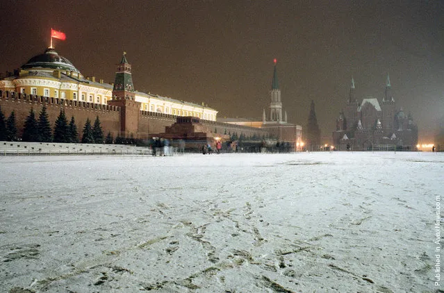 For one of the last times, the Soviet flag flies over the Kremlin at Red Square in Moscow, on Saturday night, December 21, 1991. The flag was replaced by the Russian flag on New Year's