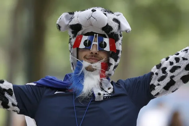 Football Soccer, France vs Romania, EURO 2016, Group A, Paris, France on June 10, 2016. A France soccer fan arrives at fan zone in Paris. (Photo by Gonzalo Fuentes/Reuters)