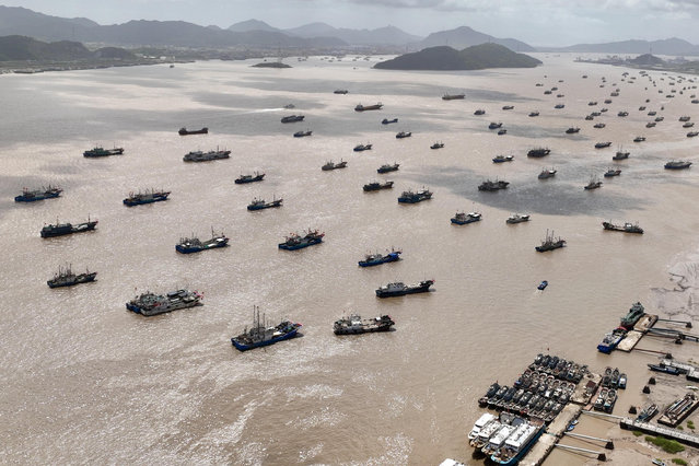 Aerial photo shows fishing vessels anchoring at a harbor to avoid approaching Typhoon Pulasan in Ningbo City, south China's Zhejiang Province, on September 19, 2024. (Photo by Rex Features/Shutterstock)