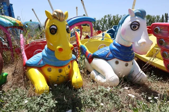 This picture shows abandoned toys and material in the Wonderland Eurasia theme park near the Turkish capital, Ankara, on July 21, 2022, during a press visit to mark its transfer to Ankara Metropolitan Municipality. (Photo by Adem Altan/AFP Photo)