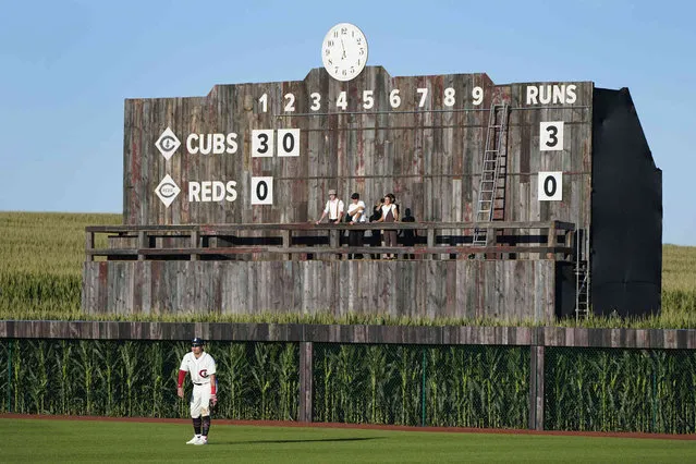 Chicago Cubs right fielder Seiya Suzuki plays against the Cincinnati Reds in the second inning during a baseball game at the Field of Dreams movie site, Thursday, Augudt 11, 2022, in Dyersville, Iowa. (Photo by Charlie Neibergall/AP Photo)