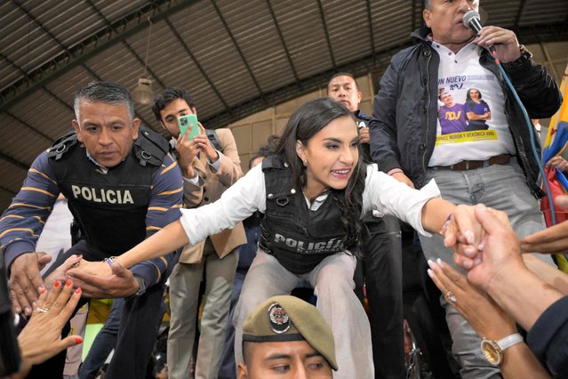 Ecuador's vice-presidential candidate for the National Democratic Action Party, Veronica Abad, greets supporters in Quito, Ecuador, on October 15, 2023, after learning the results of the presidential runoff election. Ecuador's youngest-ever president-elect, Daniel Noboa, vowed Sunday after his election win to work to “restore peace” to the South American country in the grips of a bloody drug gang war. (Photo by Rodrigo Buendía/AFP Photo)