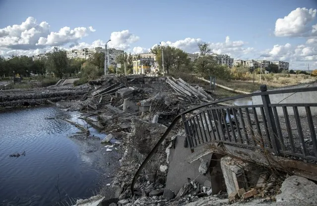 A collapsed bridge is seen in downtown Bakhmut, after it was torn down to halt the advance of Russian troops as fighting between Ukrainian forces and Russian troops intensifies for control of the city in Bakhmut, Ukraine on October 04, 2022. (Photo by Narciso Contreras/Anadolu Agency via Getty Images)