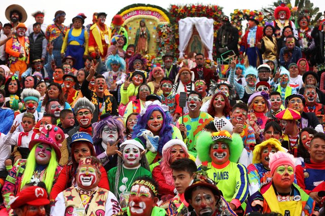 Clowns take part in a procession to pay homage to Mexico's patron saint, Our Lady of Guadalupe, at the Basilica of Our Lady of Guadalupe in Mexico City, Mexico on December 13, 2023. (Photo by Luis Cortes/Reuters)