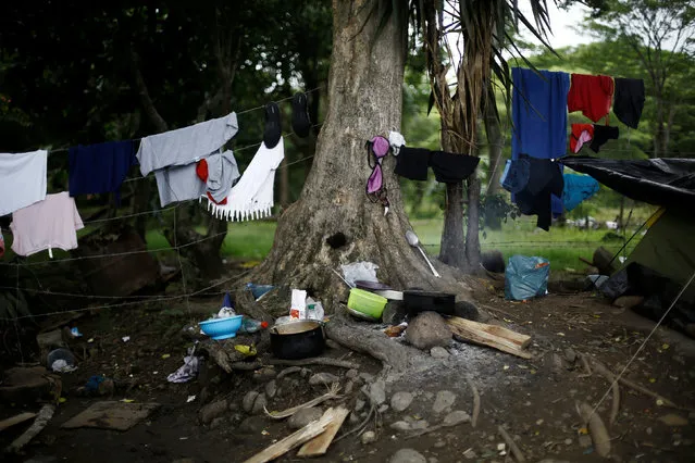 Dishes and clothes of African migrants stranded in Costa Rica are seen near a makeshift camp at the border between Costa Rica and Nicaragua, in Penas Blancas, Costa Rica, September 8, 2016. (Photo by Juan Carlos Ulate/Reuters)