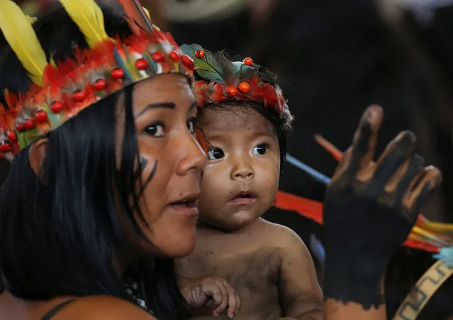 Members of an indigenous group from the Amazon region attend a meeting with Pope Francis at the Coliseo Regional Madre de Dios in Puerto Maldonado, Peru on January 19, 2018. (Photo by Alessandro Bianchi/Reuters)