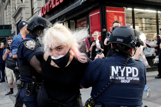 Law enforcement officers detain a demonstrator during a protest against federal immigration sweeps near the U.S. immigration court at the Jacob K. Javits Federal Building in New York City, on June 10, 2025. (Photo by Eduardo Munoz/Reuters)