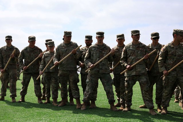 Members of the U.S. National Guard train for crowd control with batons, as improvements of living conditions for about 4,000 members of the U.S. National Guard take place, at Joint Forces Training Base in Los Alamitos, California on June 19, 2025. (Photo by David Swanson/Reuters)