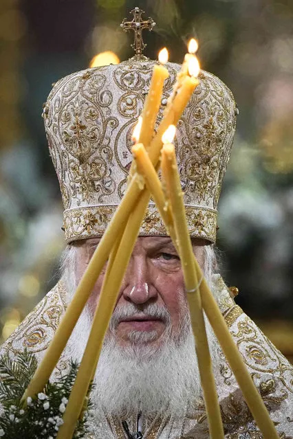 Russian Orthodox Patriarch Kirill delivers a Christmas service in the Christ the Saviour Cathedral in Moscow, Russia, Friday, January 6, 2023. Orthodox Christians celebrate Christmas on Jan. 7, in accordance with the Julian calendar. (Photo by Alexander Zemlianichenko/AP Photo/Pool)