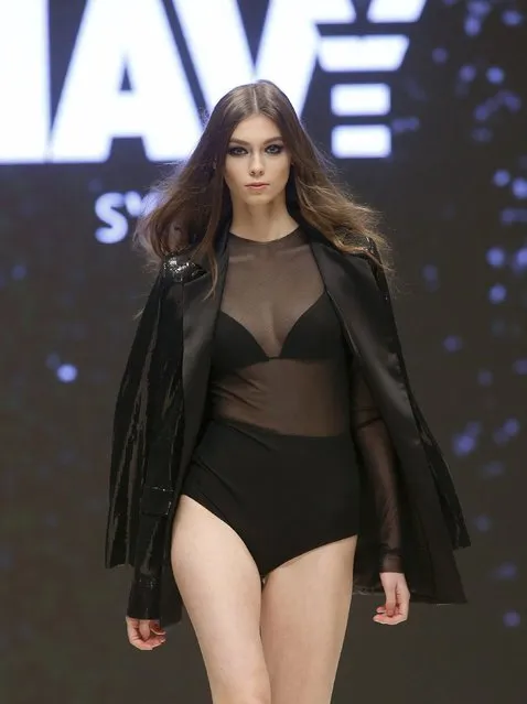 A model presents a creation by Belarusian brand name Navi during "Belarus Fashion Week Spring-Summer 2016" in Minsk, October 22, 2015. (Photo by Vasily Fedosenko/Reuters)