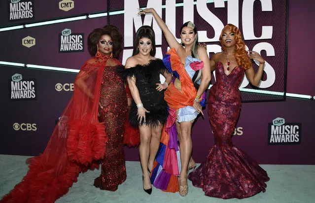 Drag queens Kennedy Davenport, from left, Jan Sport, Manila Luzon and Olivia Lux arrive at the CMT Music Awards on Sunday, April 2, 2023, at the Moody Center in Austin, Texas. (Photo by Evan Agostini/Invision/AP Photo)
