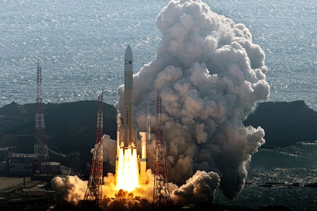 In this aerial image, the H3 Launch Vehicle No.7 (H3-7) lifts off from the launch pad at the Japan Aerospace Exploration Agency Tanegashima Space Center on October 26, 2025 in Minamitane, Kagoshima, Japan. New unmanned cargo transfer spacecraft1 (HTV-X1) is successfully thrown into the orbit, transporting supplies to the International Space Station (ISS). (Photo by The Asahi Shimbun via Getty Images)