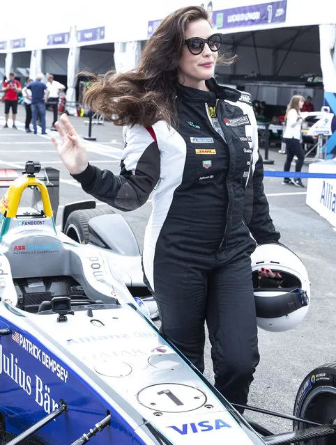 American actress Liv Tyler visits Formula E Championship with her children in New York, NY on July 18, 2018. Liv Tyler dons Formula E overalls as she poses by electric cars before the last race of the season. (Photo by Splash News and Pictures)