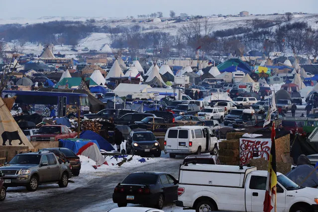 Vehicles and campsites fill the Oceti Sakowin camp as “water protectors” continue to demonstrate against plans to pass the Dakota Access pipeline near the Standing Rock Indian Reservation, near Cannon Ball, North Dakota, U.S., December 3, 2016. (Photo by Lucas Jackson/Reuters)